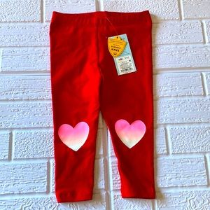 Red color leggings with heart design